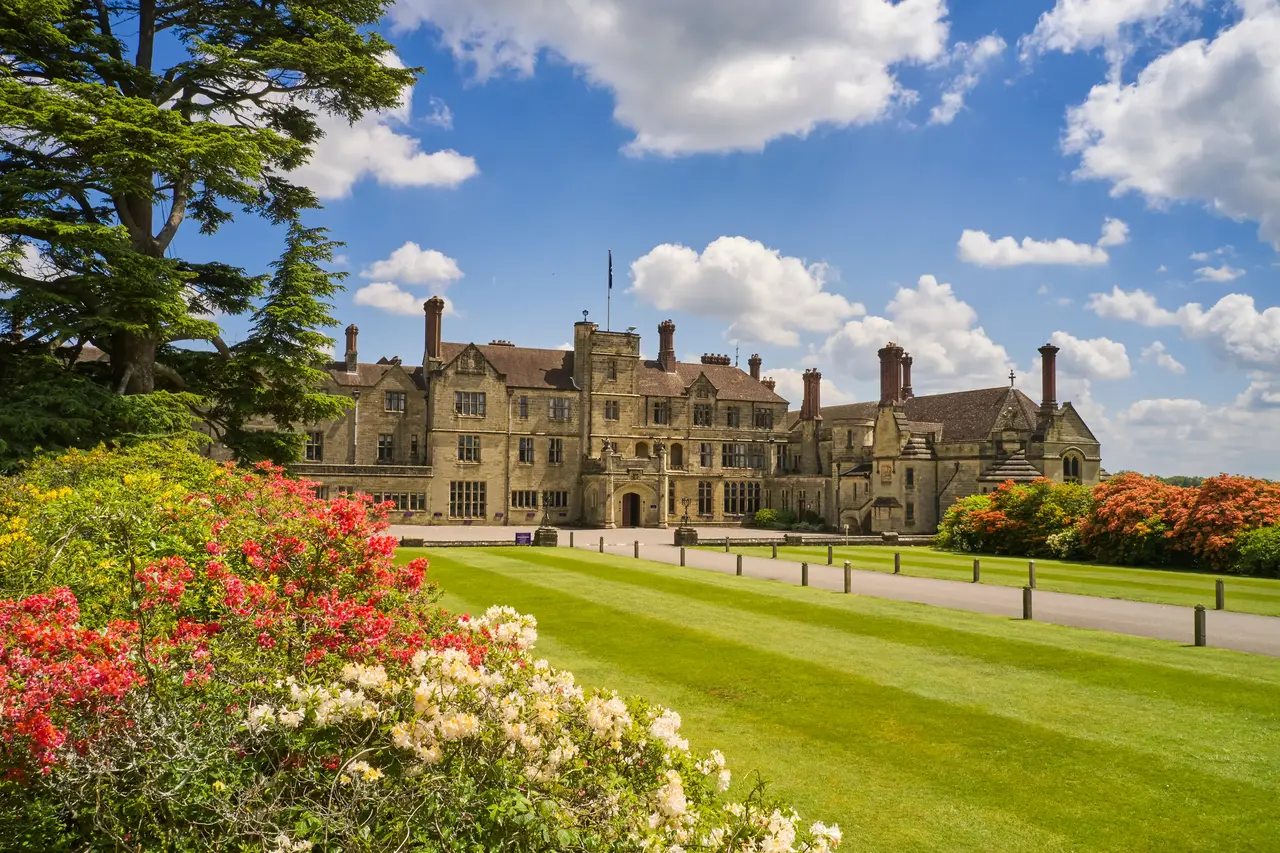 Worth School campus in Turners Hill, West Sussex, with historic buildings, lawns, and gardens, a setting for psychotherapy training at The Metis Institute.